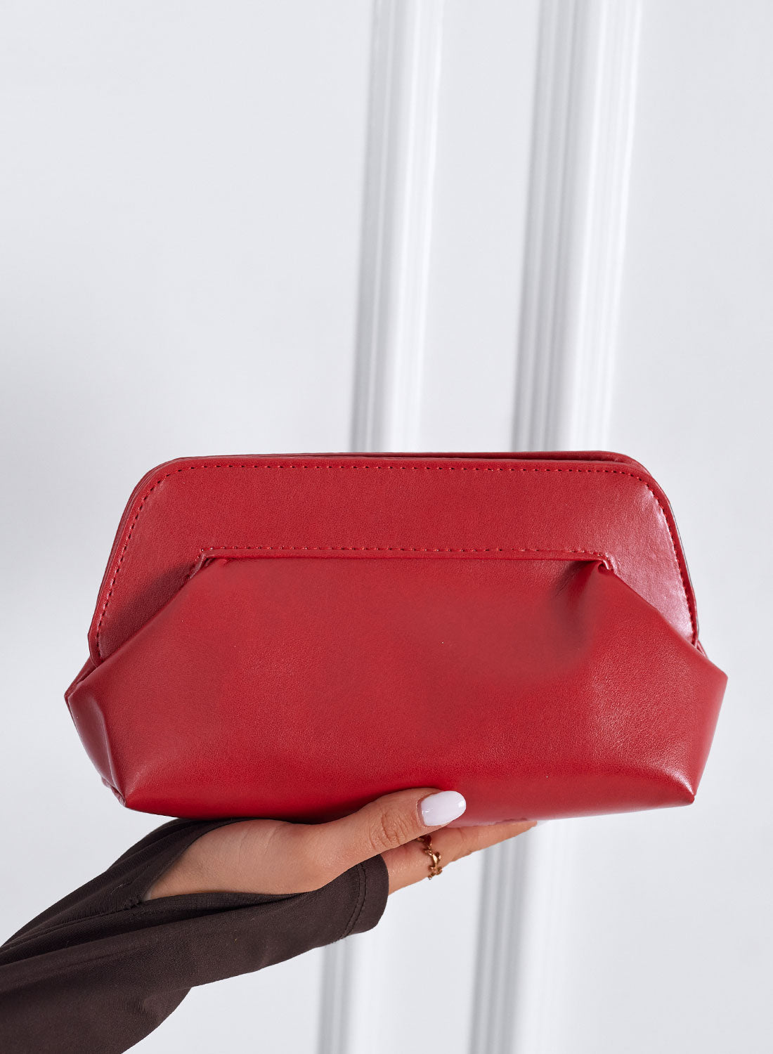 Red eco-leather clutch bag with chain