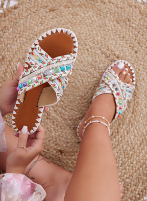 White flat slide sandals with multicolor studs