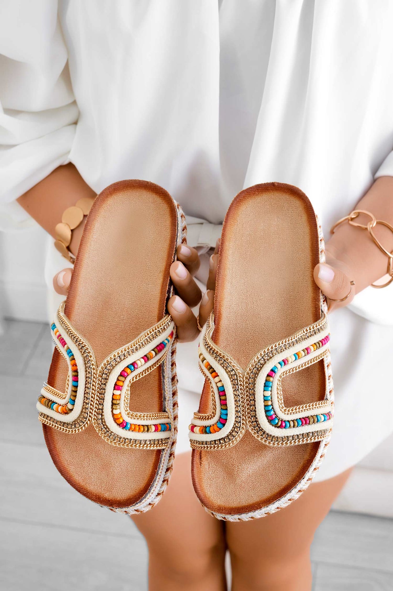 Beige slide sandals with multicolor stones