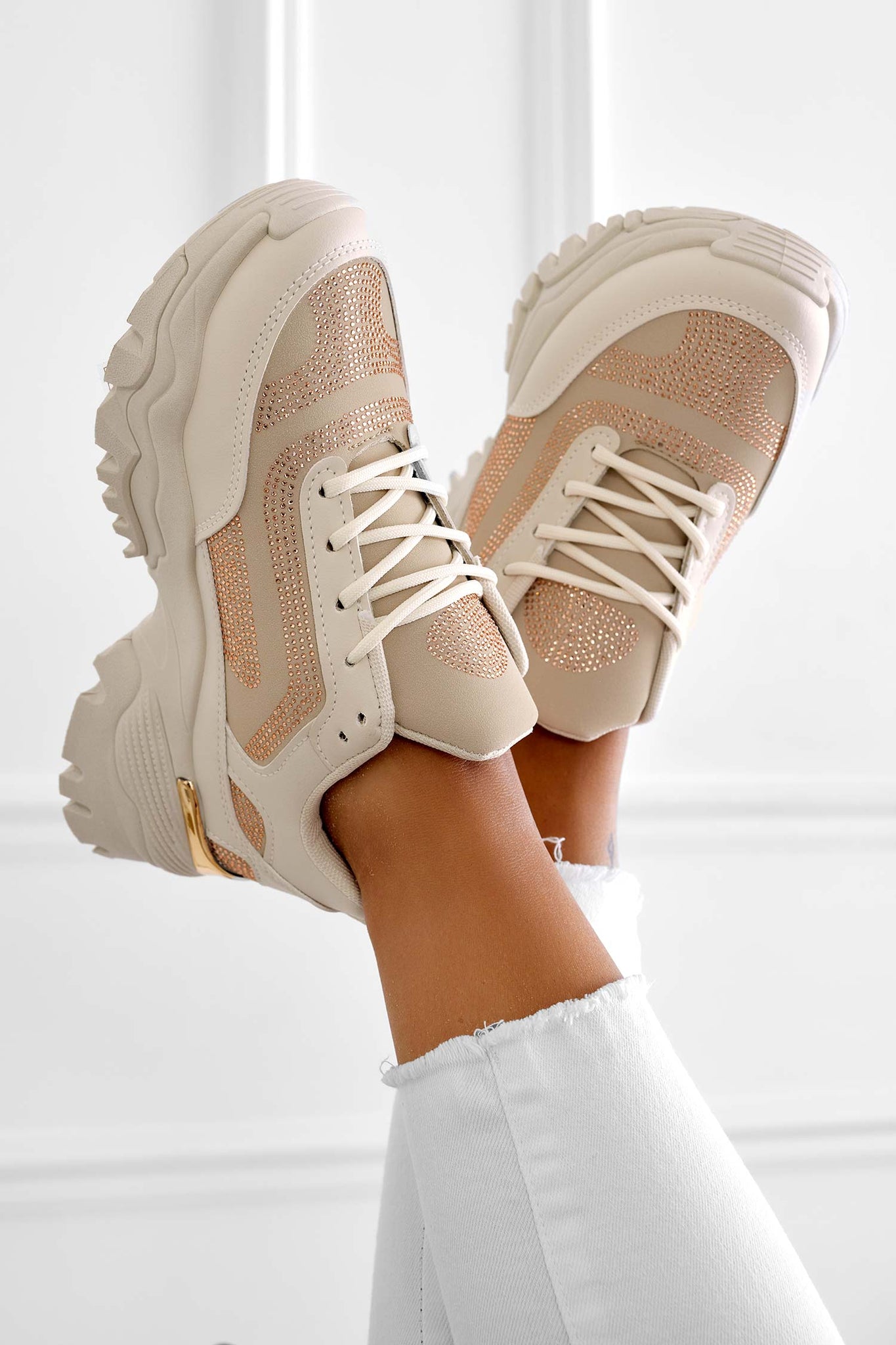 Beige sneakers with thick sole and rhinestones