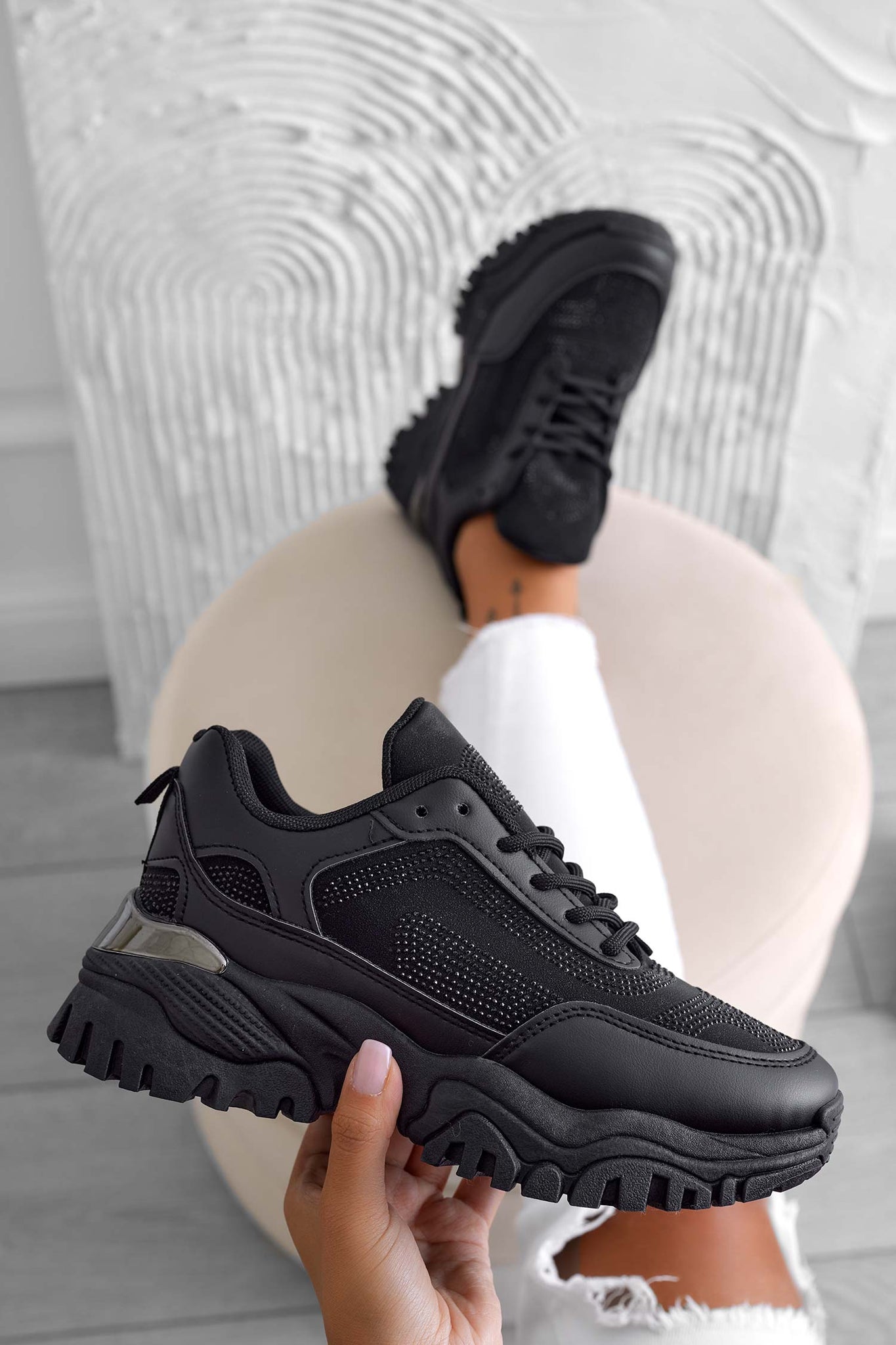 Black sneakers with thick sole and rhinestones
