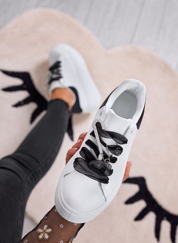ANGY - White platform sneakers with black organza laces and jeweled brooch