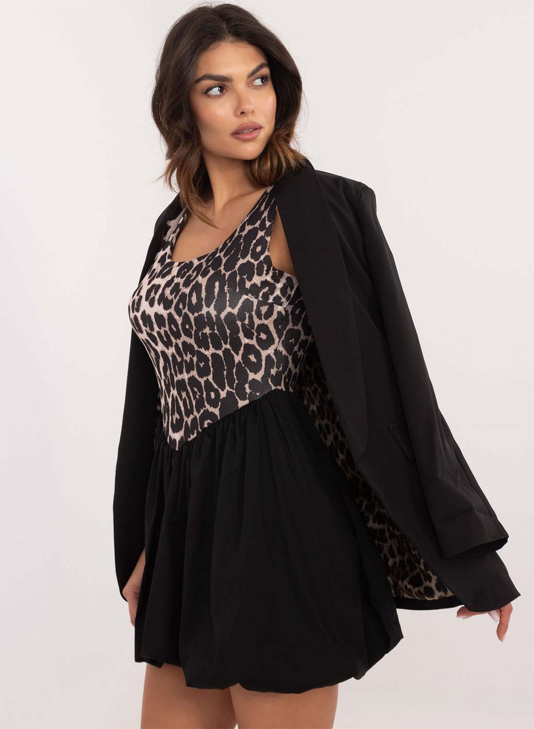 Leopard print dress with contrasting black skirt
