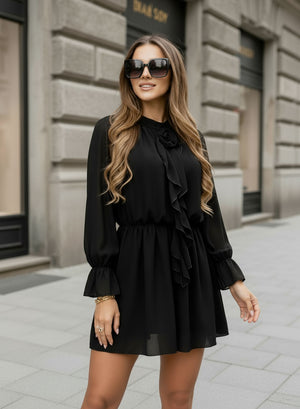 Black dress in voile with ruffles