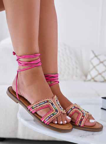 Fuchsia flat sandals with multicolor beaded laces