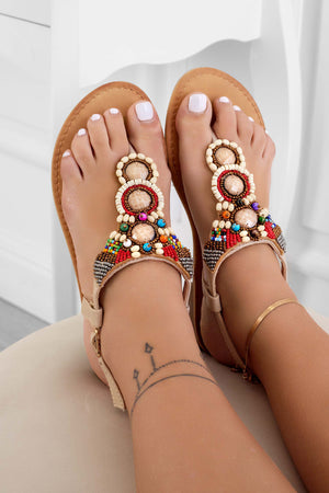 Beige flat thong sandals with multicolor stones