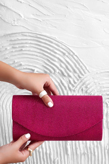 Fuchsia B220 clutch bag in laminated fabric