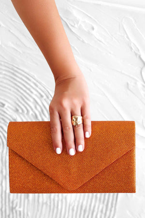 B221 orange glitter clutch bag