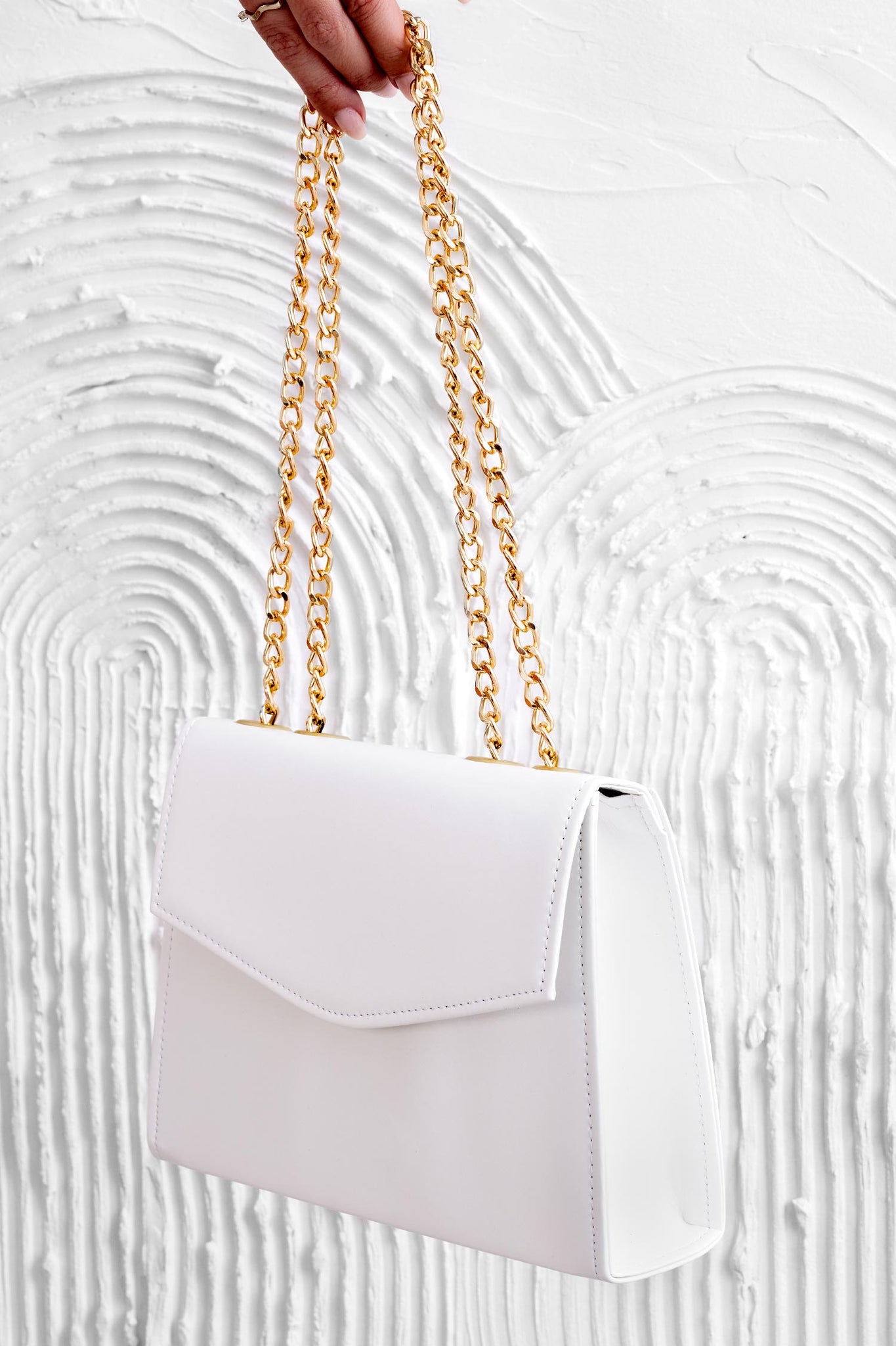 White B217 clutch bag with gold chain