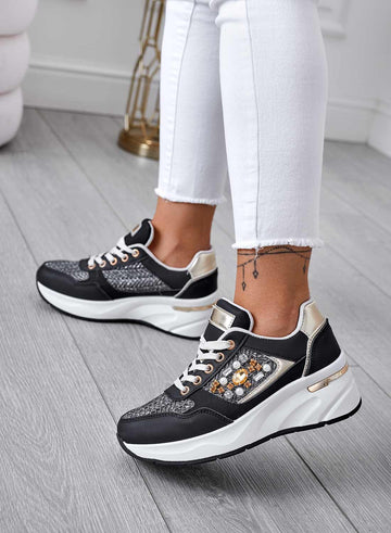 Black sneakers with fabric inserts and jewels