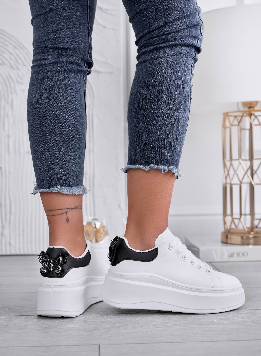 CRISTINA - White sneakers with black heel and jeweled butterfly