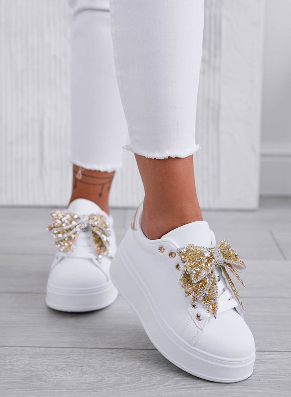 CRYSTAL - Sneakers bianche con zeppa e fiocco gioiello oro