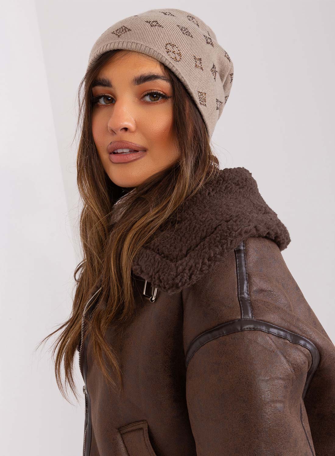 Padded mud-colored hat with rhinestone applications