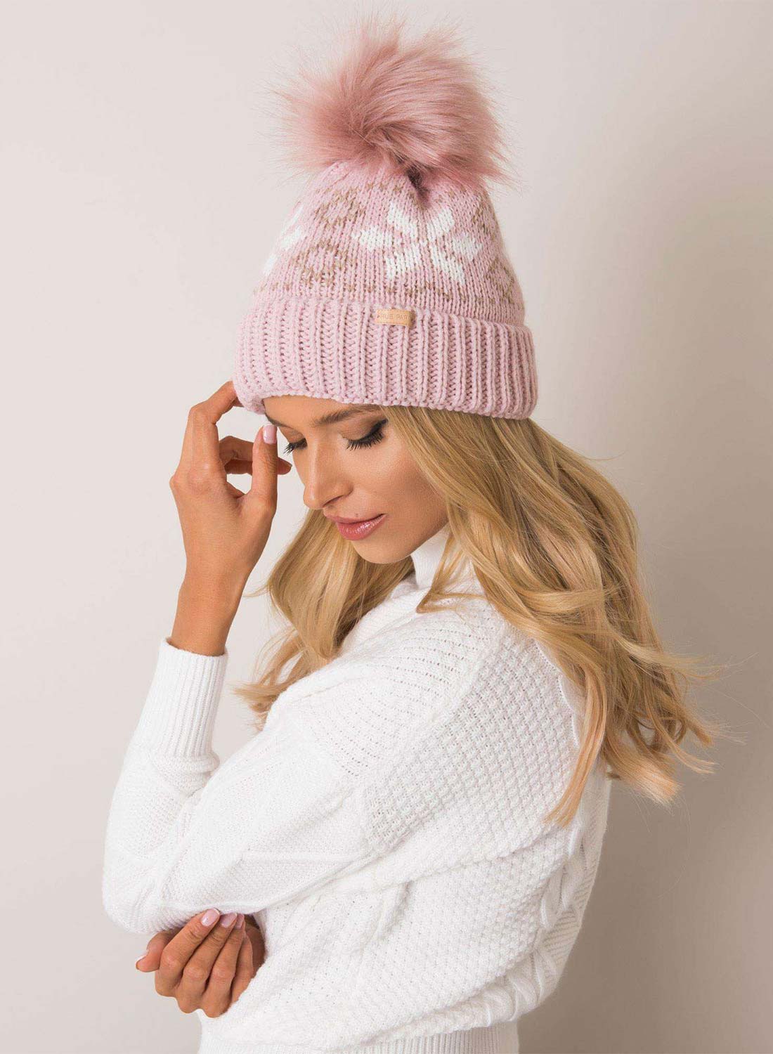Two-tone pink padded hat with faux fur pompom