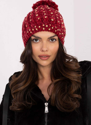 Red padded hat with rhinestones and pompom