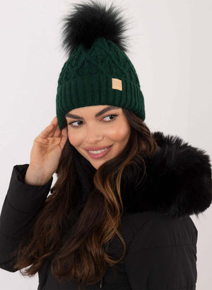 Green padded hat with faux fur pompom