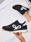 DIAZ - Sneakers nere con fiocco bianco e suola bicolore