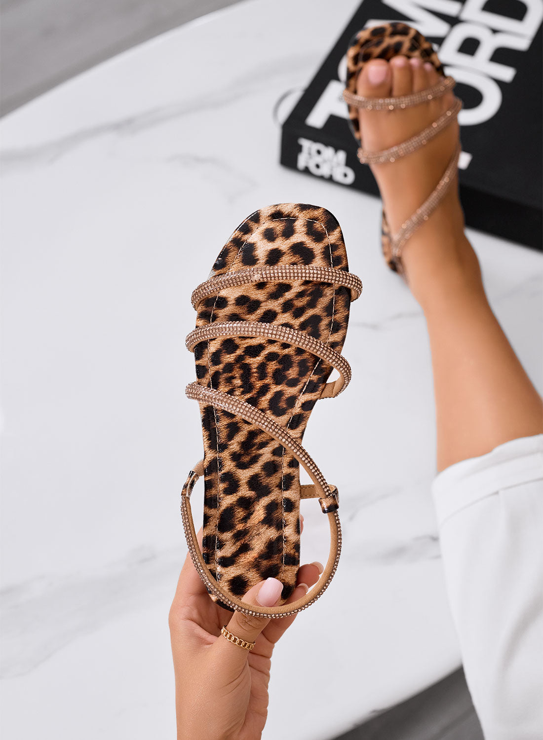 DILARA - Low leopard print sandals with crossed rhinestone straps