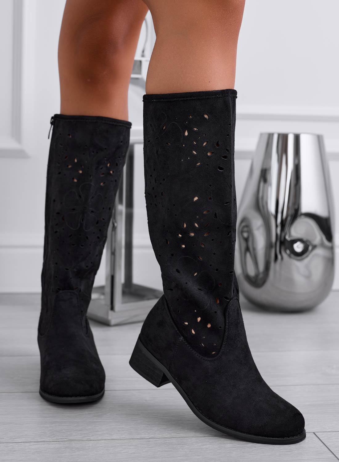 Black perforated suede mid-calf boots
