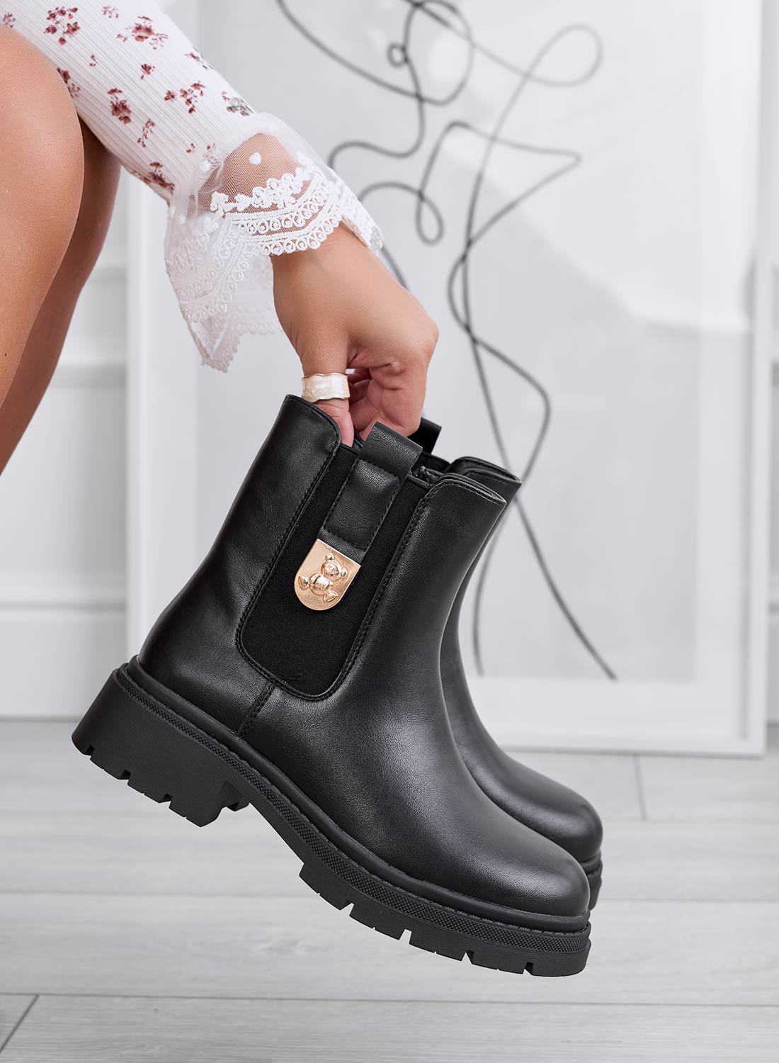 EMILIANA - Black ankle boots with side elastic and gold detail