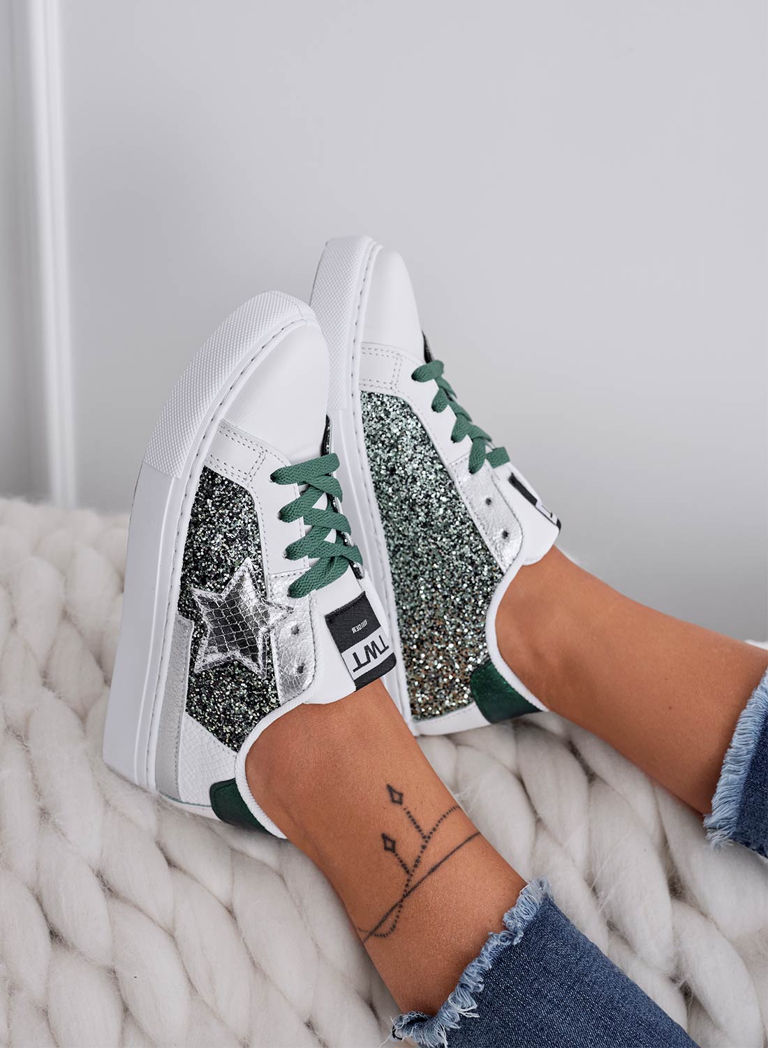 White sneakers with star and green glitter inserts
