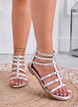 Silver flat sandals wrapped with studs