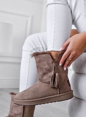 Mud ankle boots with tassels and padding