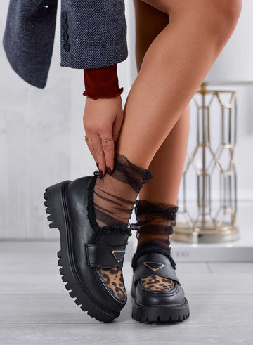 Black loafers with animal print inserts