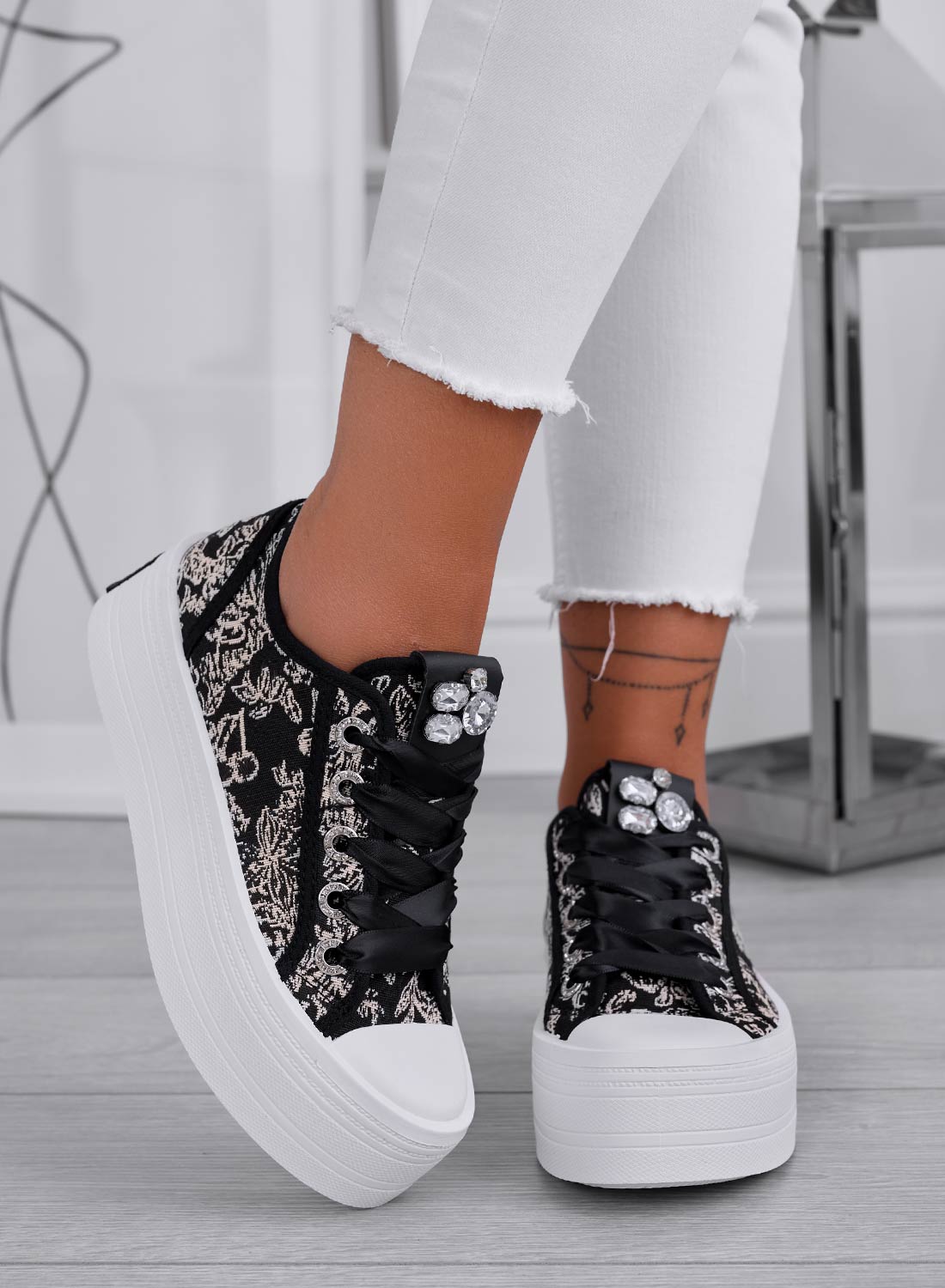 Black patterned sneakers with rhinestones and thick sole
