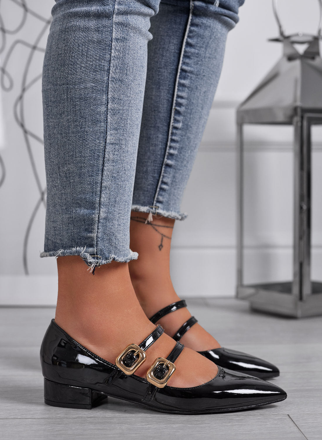 IOLE - Black patent Mary Jane shoes with double gold buckle