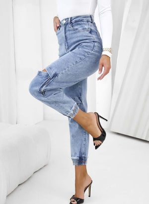 Blue jeans trousers with opening and zip