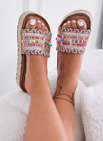 Beige slip-on sandals with wedge heel and multicolor studs