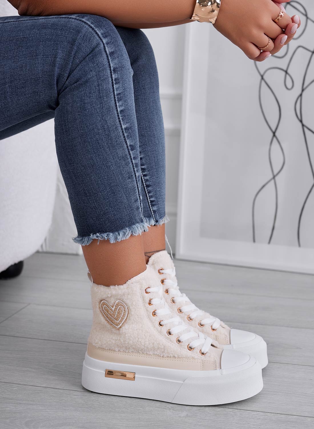 Beige high-top sneakers in faux fur with gold heart
