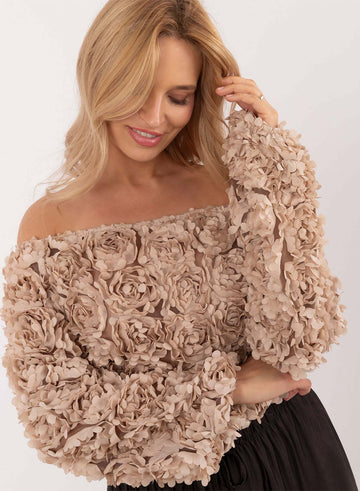 Beige sweater with floral appliqués and boat neckline