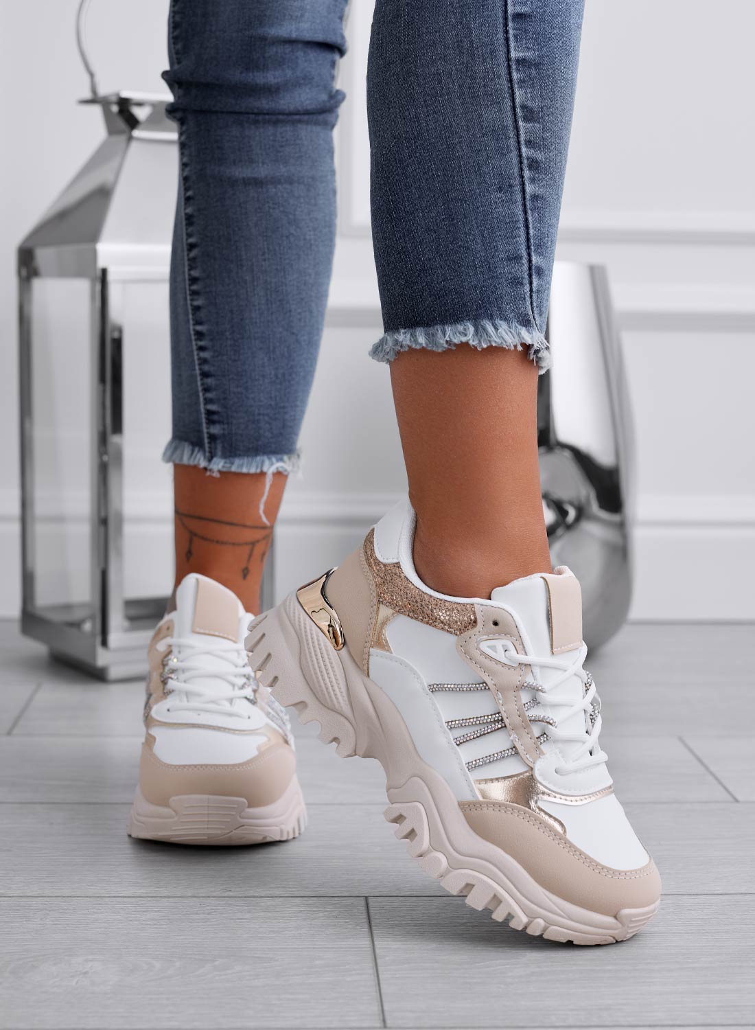 White sneakers with beige and gold inserts
