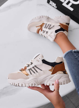 Beige sneakers with brown inserts