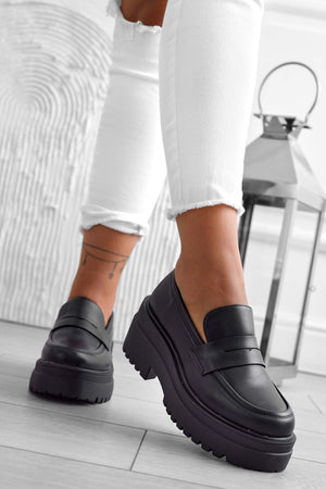 Black loafers with thick sole