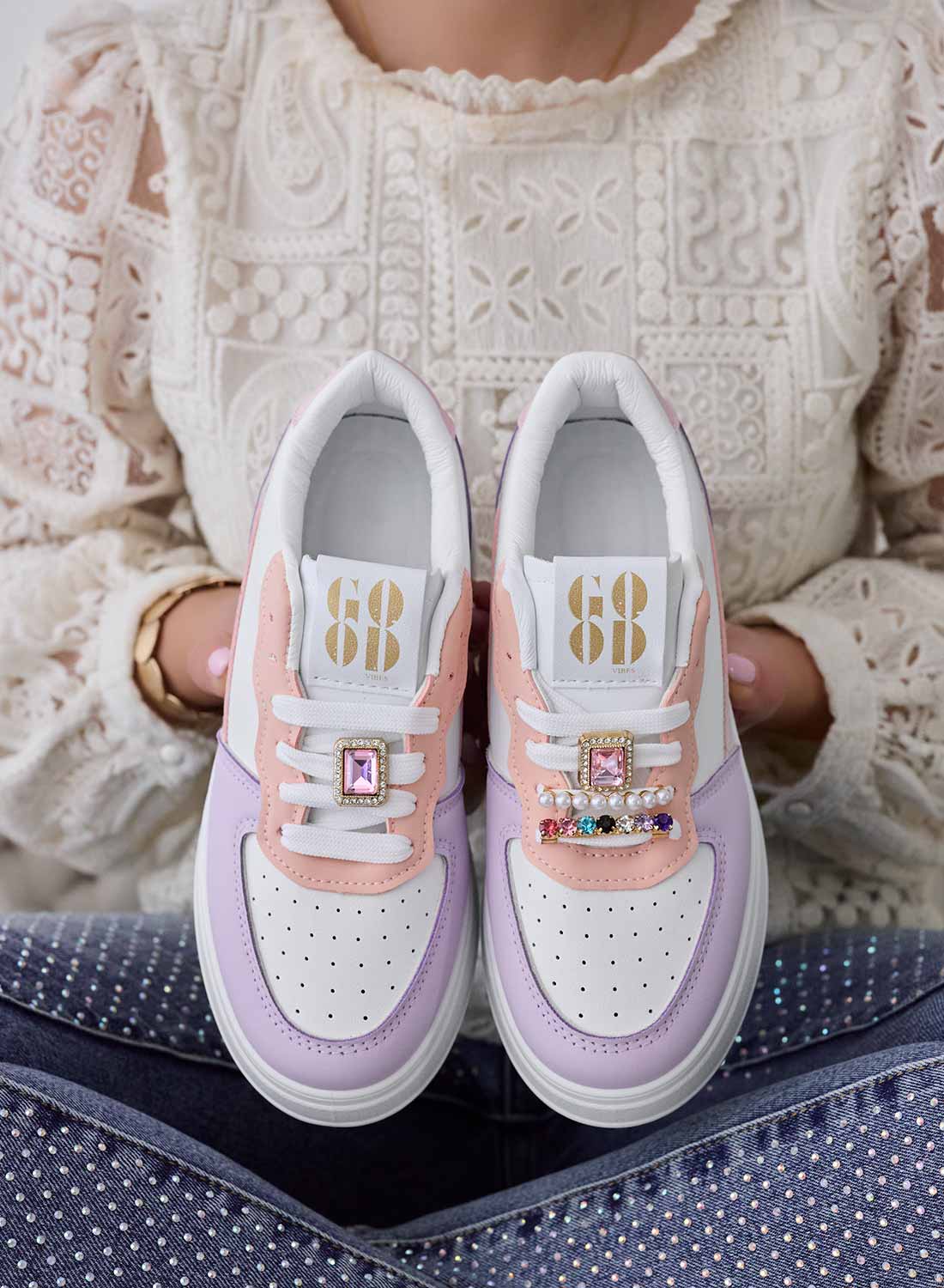 White sneakers with lilac inserts and jewel applications