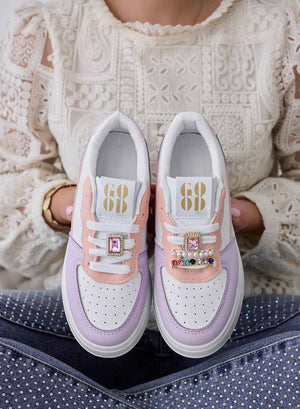 White sneakers with lilac inserts and jewel applications