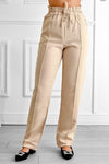 Pantalon beige avec élastique et cordon à la taille