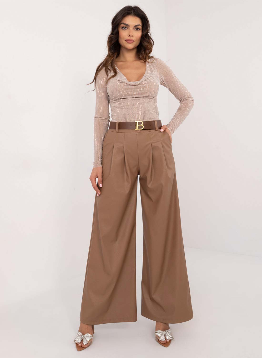 Faux leather flared trousers in mud color
