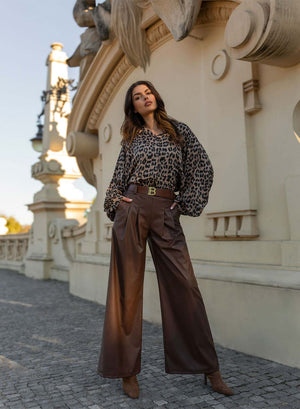 Brown faux leather flared trousers