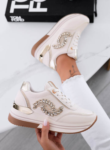Beige sneakers with gold jewel embellishment