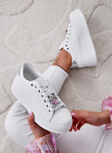 White sneakers with silver heel and pink jewel teddy bear