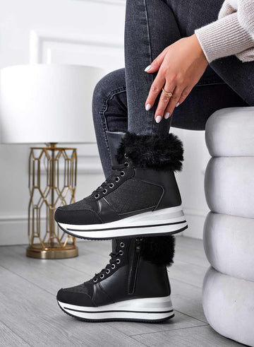 Black sneakers with faux fur trim and lining