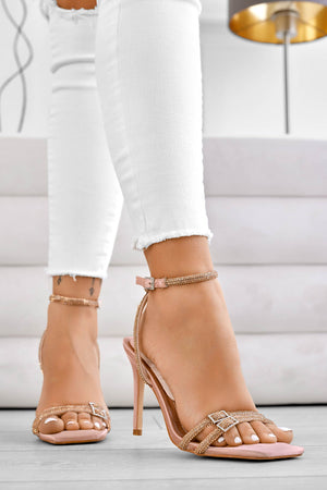 Pink jeweled sandals with high heel and ankle strap