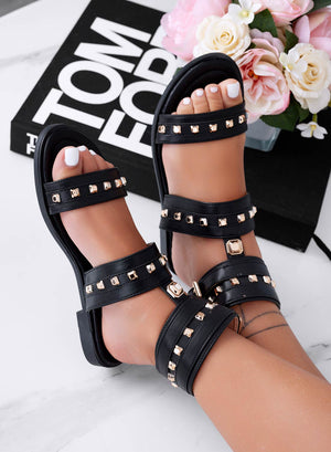 TRISHA - Black flat sandals with buckles and gold studs