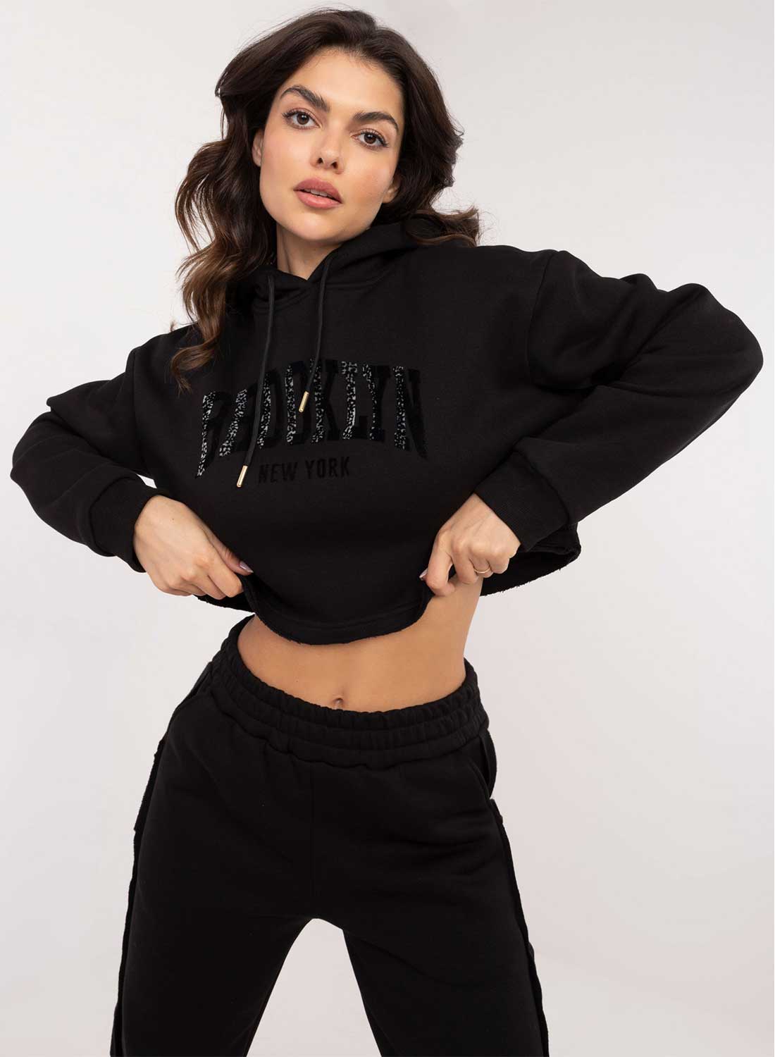 Black two-piece fleece tracksuit with "Brooklyn" print