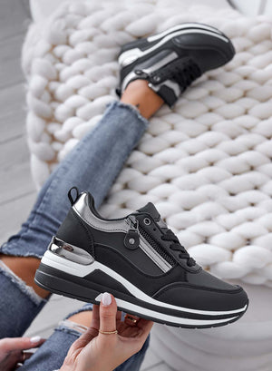 Black sneakers with silver inserts