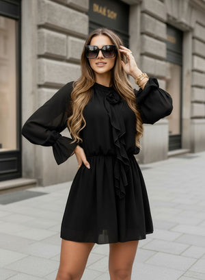 Black dress in voile with ruffles